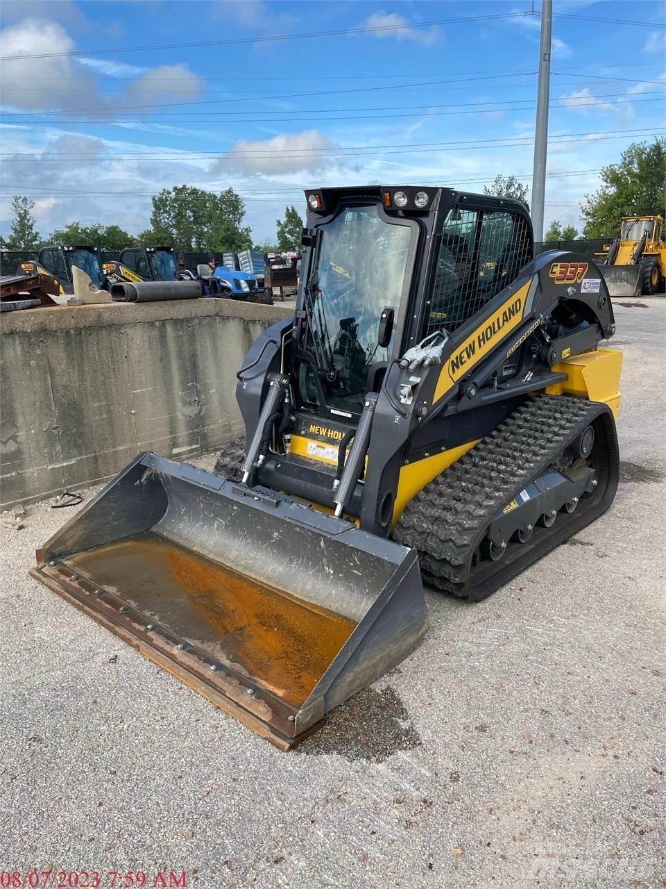 New Holland C337 لوادر انزلاقية التوجيه