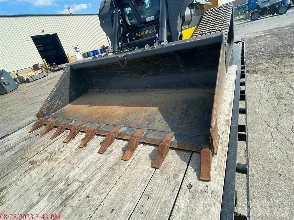 New Holland C337 لوادر انزلاقية التوجيه