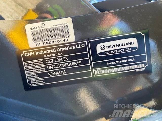 New Holland C337 لوادر انزلاقية التوجيه