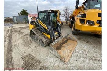 New Holland C345 لوادر انزلاقية التوجيه