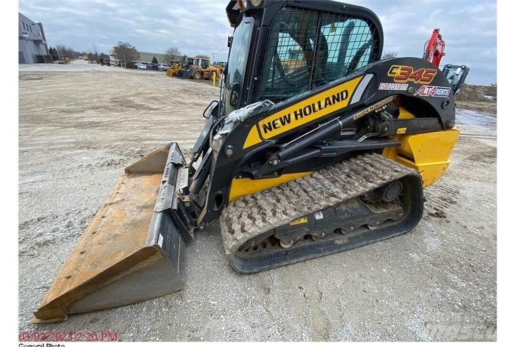 New Holland C345 لوادر انزلاقية التوجيه