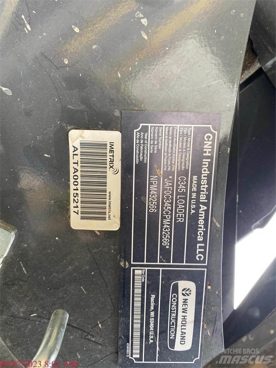 New Holland C345 لوادر انزلاقية التوجيه
