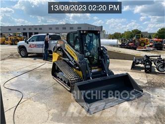 New Holland C345 لوادر انزلاقية التوجيه