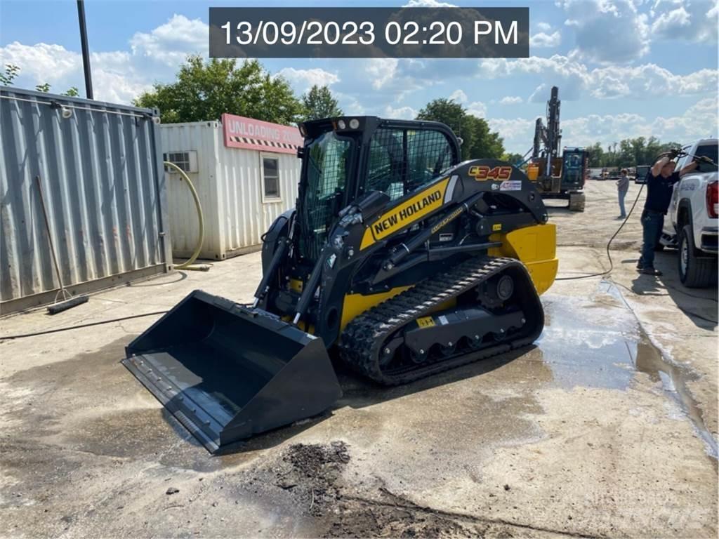 New Holland C345 لوادر انزلاقية التوجيه