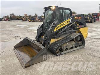 New Holland C345 لوادر انزلاقية التوجيه