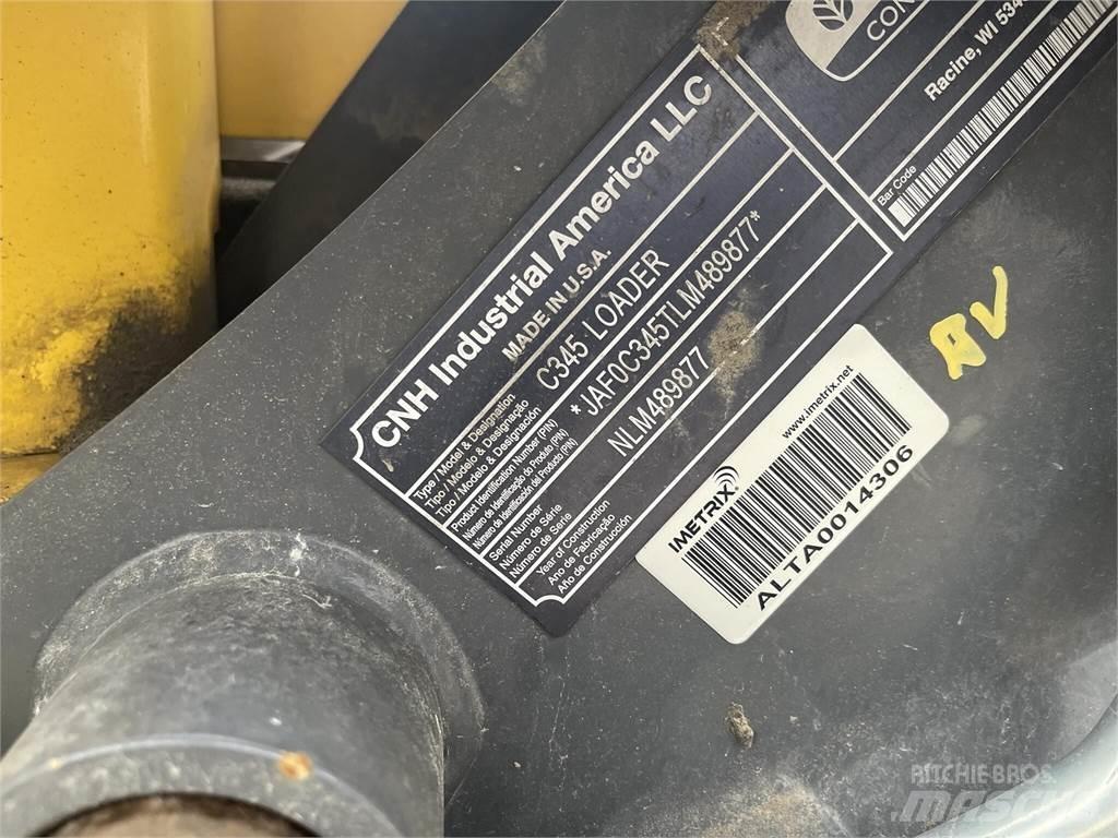 New Holland C345 لوادر انزلاقية التوجيه