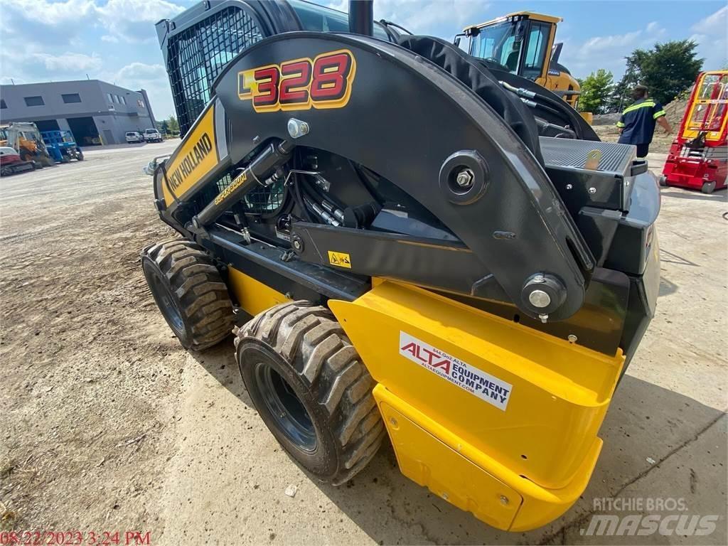 New Holland L328 لوادر انزلاقية التوجيه