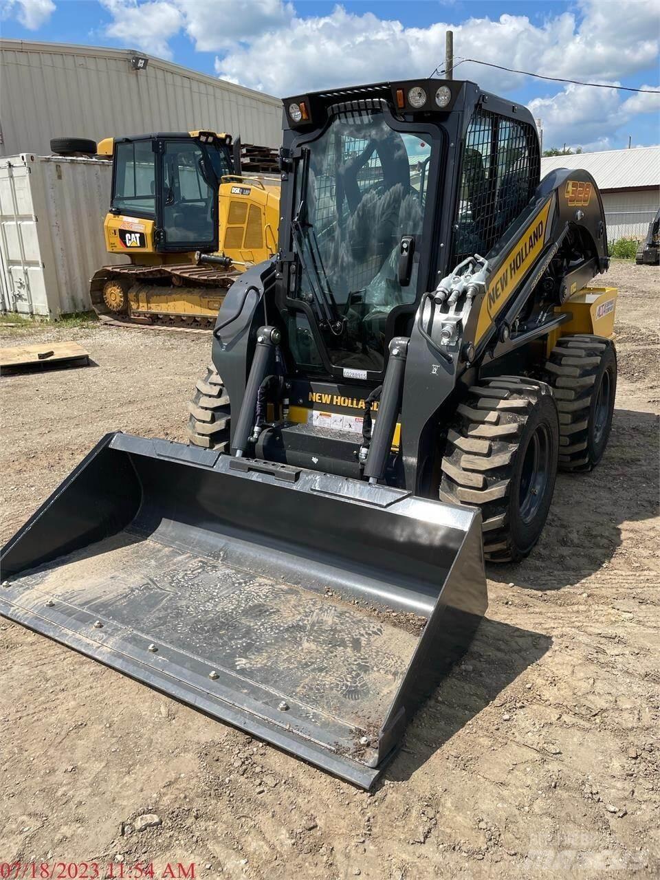 New Holland L328 لوادر انزلاقية التوجيه