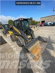 New Holland L328 لوادر انزلاقية التوجيه