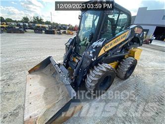 New Holland L328 لوادر انزلاقية التوجيه