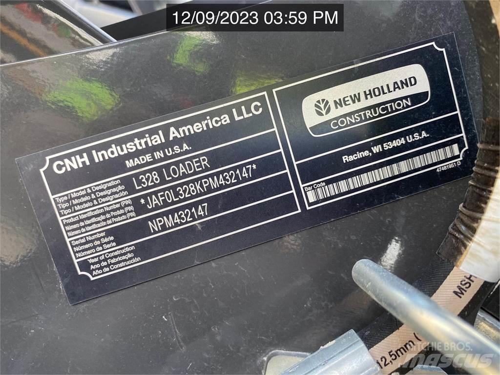 New Holland L328 لوادر انزلاقية التوجيه