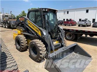 New Holland L328 لوادر انزلاقية التوجيه