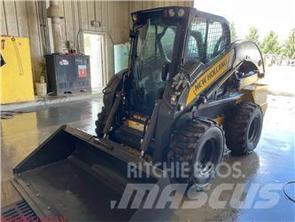 New Holland L328 لوادر انزلاقية التوجيه