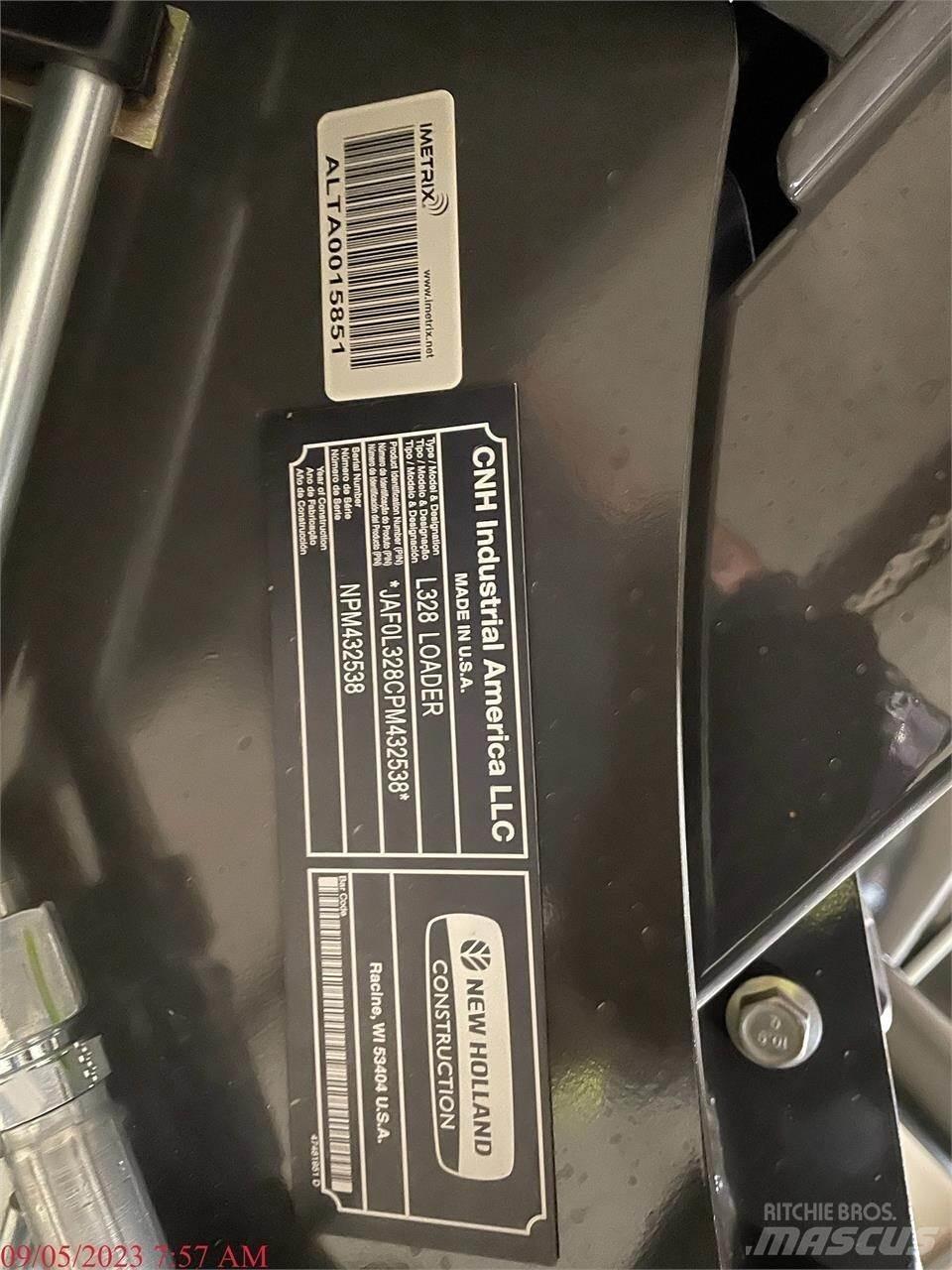 New Holland L328 لوادر انزلاقية التوجيه