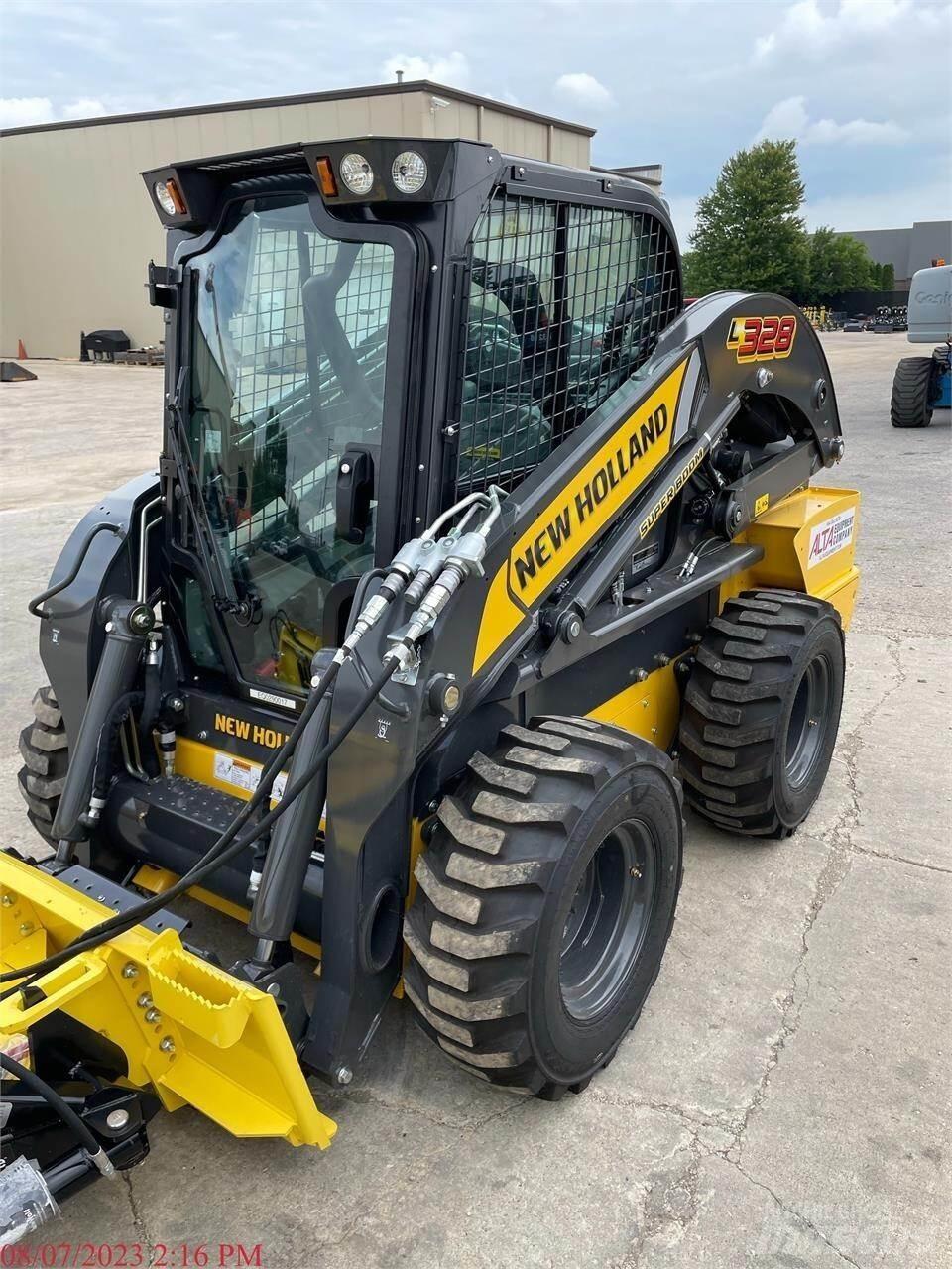 New Holland L328 لوادر انزلاقية التوجيه