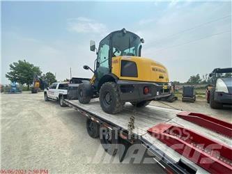 New Holland W50C لوادر بعجل