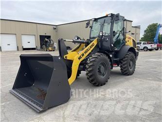 New Holland W80C لوادر بعجل