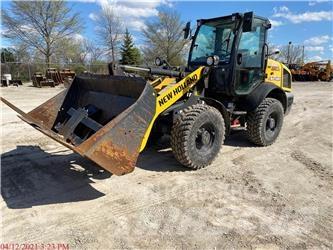 New Holland W80C لوادر بعجل
