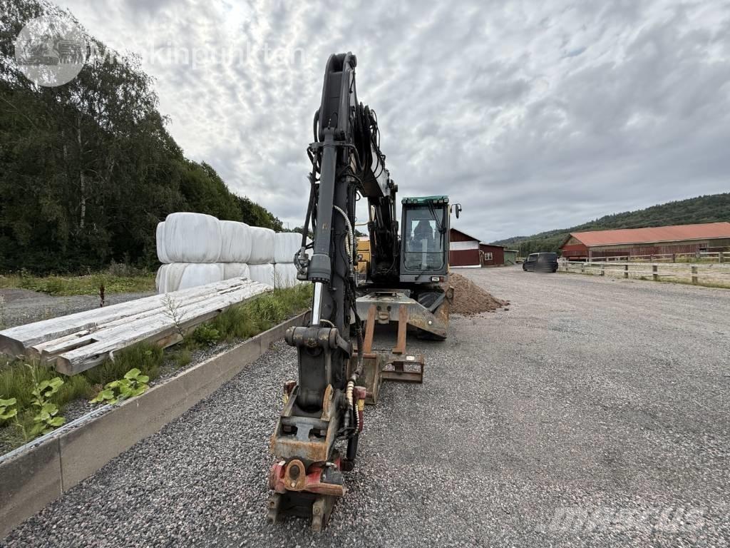 Volvo EW 140 C حفارات بعجل
