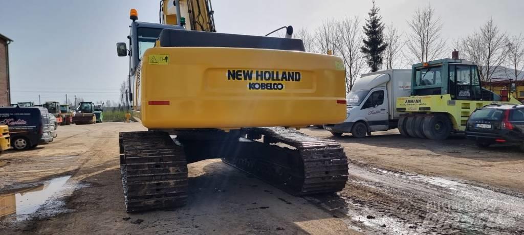 New Holland E 385 حفارات زحافة