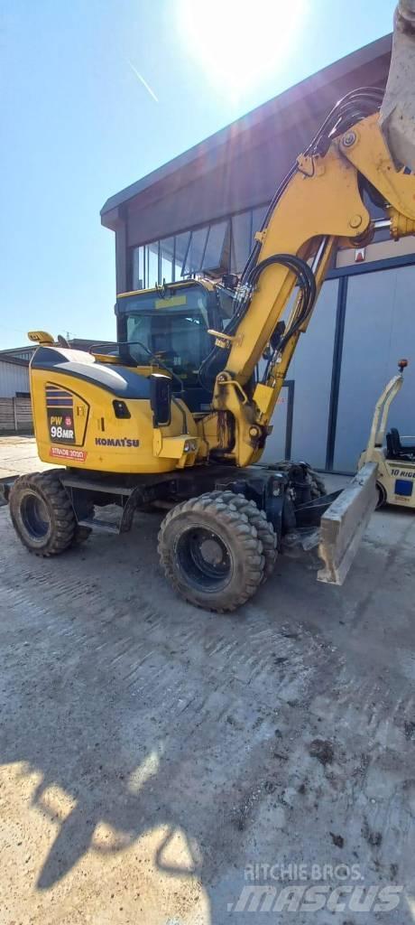 Komatsu PW98 MR-11 حفارات بعجل