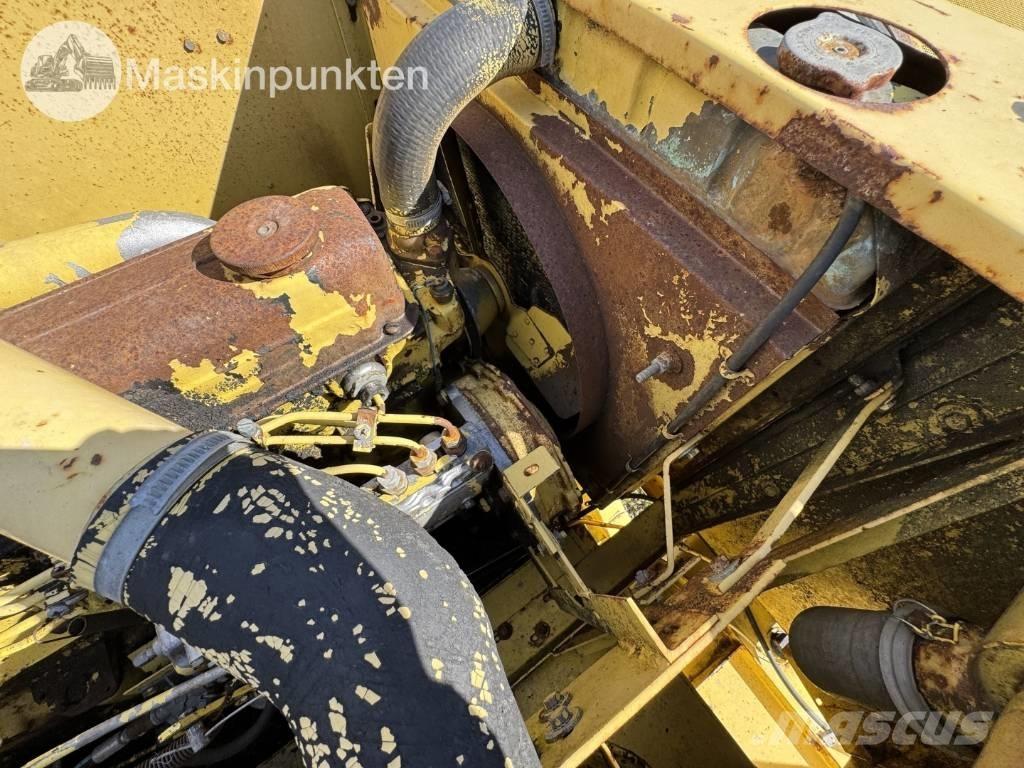 New Holland 1530 حصادات