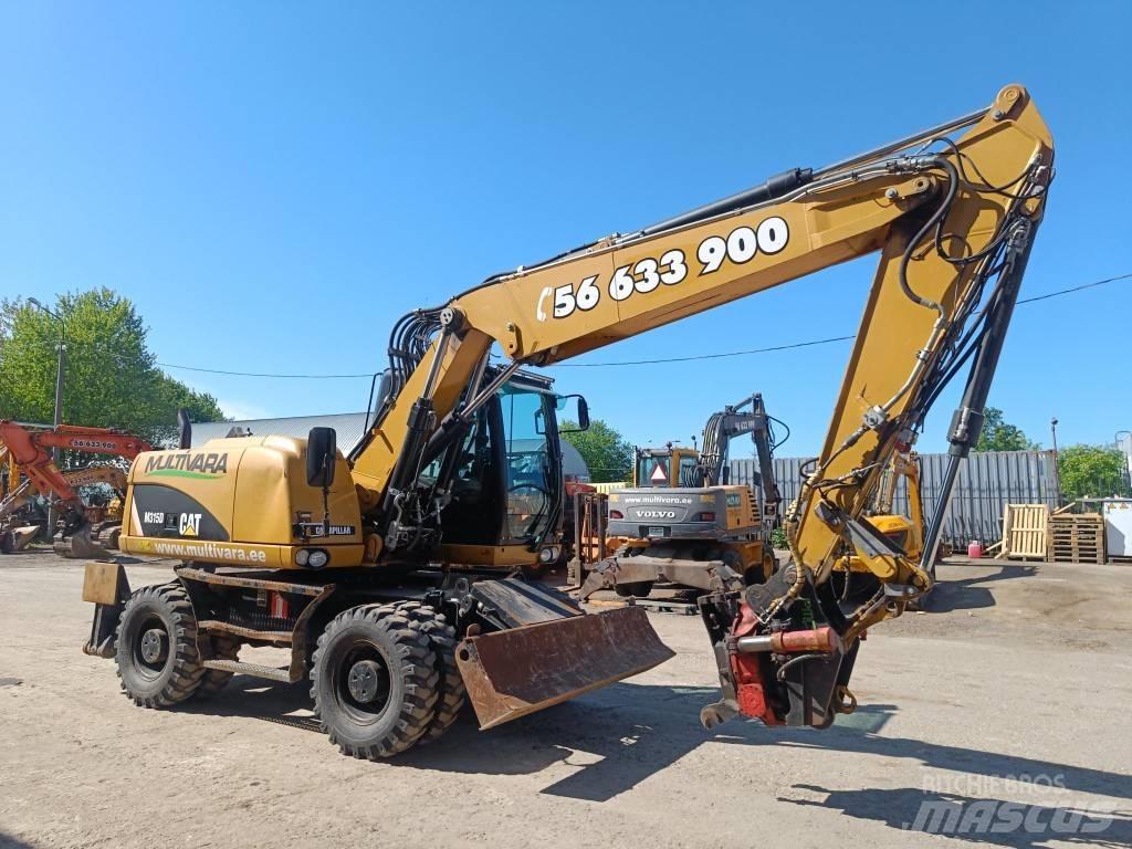 CAT M 315 D حفارات بعجل