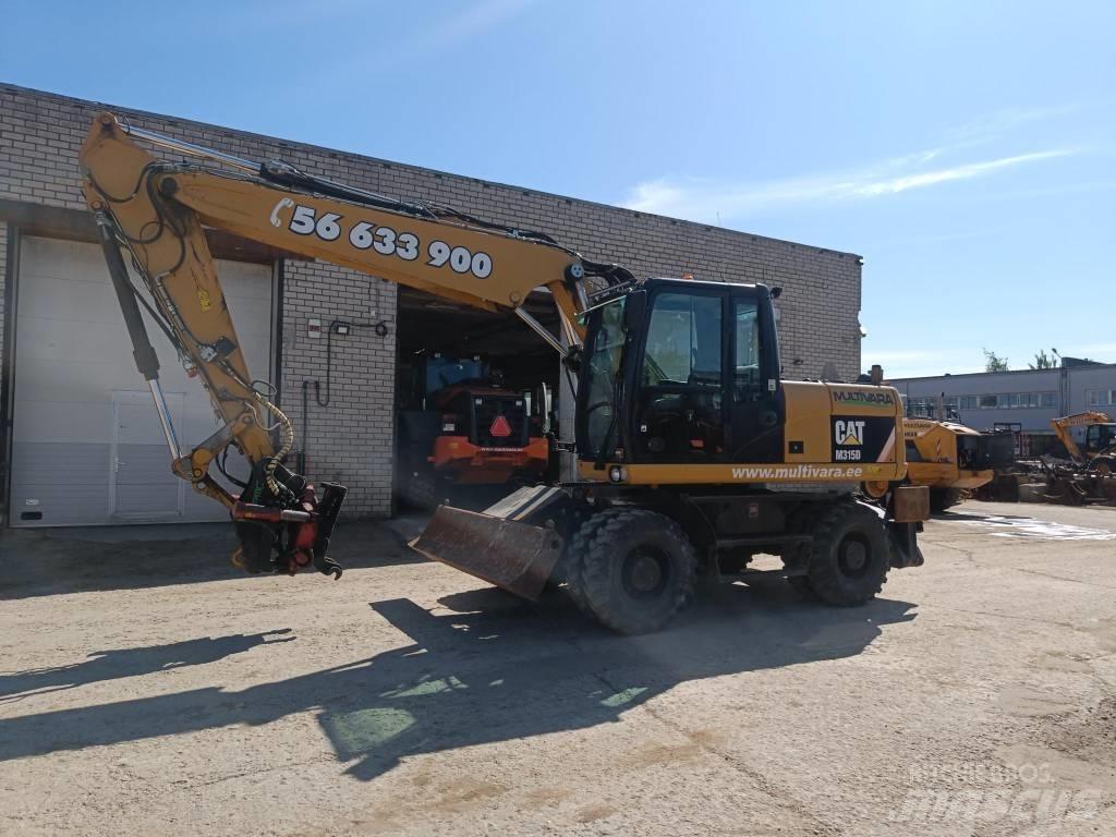 CAT M 315 D حفارات بعجل