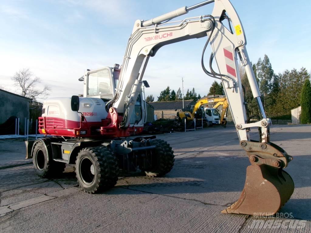 Takeuchi TB 295 W حفارات بعجل