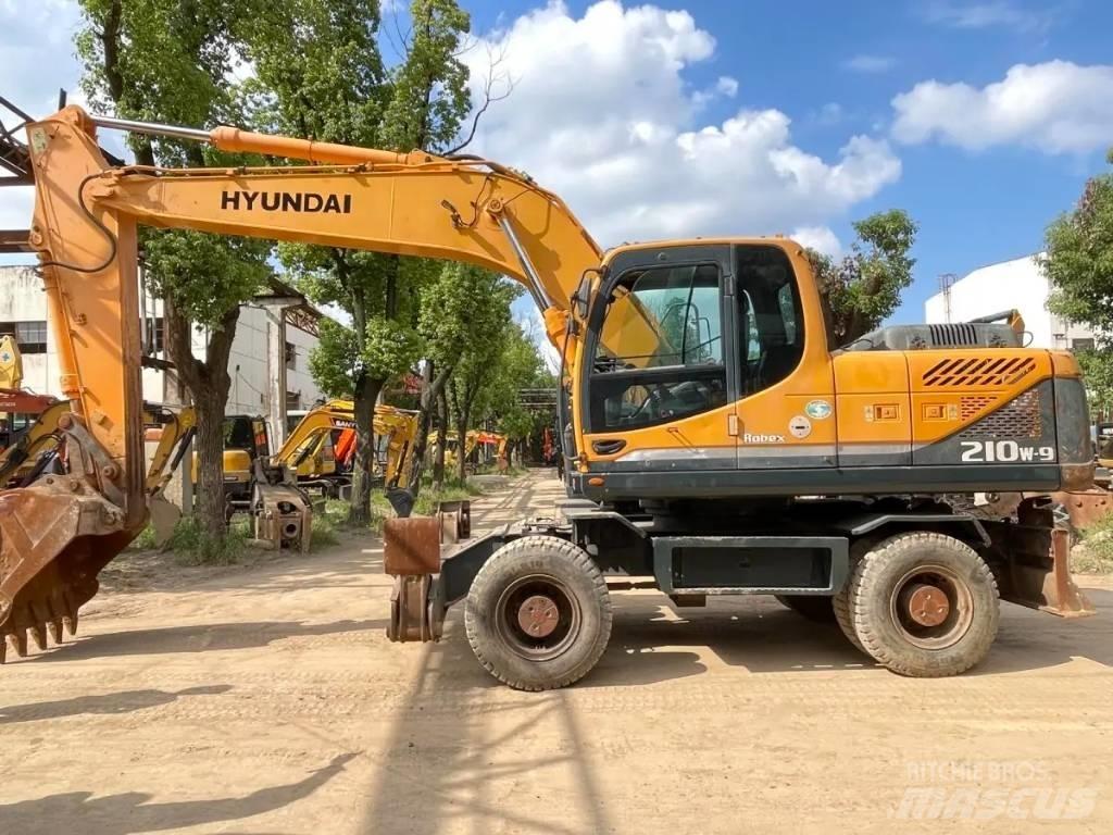 Hyundai R210W-9 حفارات بعجل