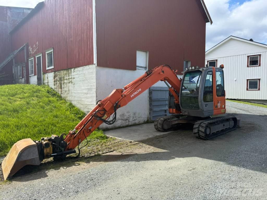 Hitachi ZX 85 US حفارات وسط 7 طن - 12 طن