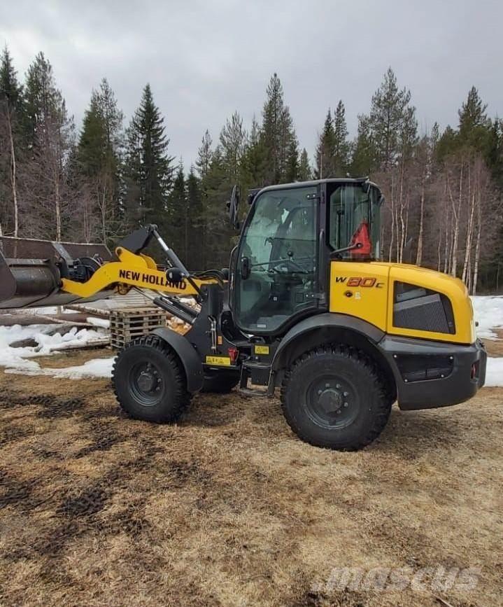 New Holland W80C لوادر بعجل