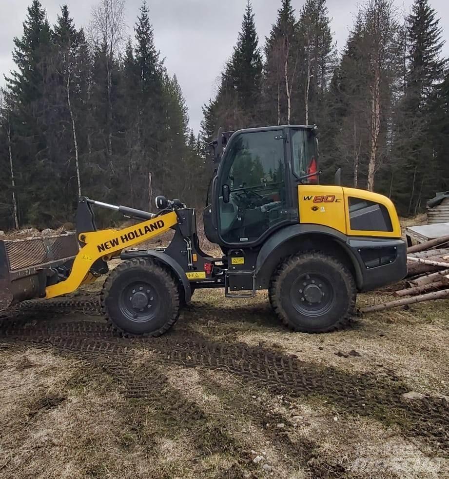New Holland W80C لوادر بعجل