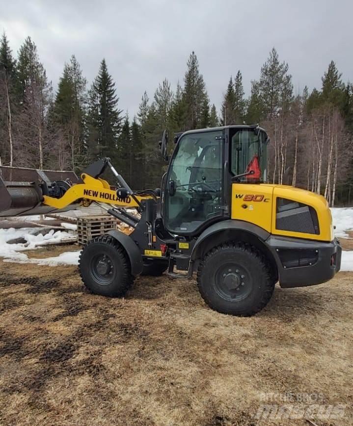 New Holland W80C لوادر بعجل