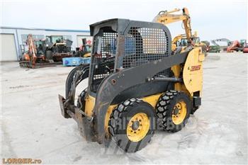 New Holland L 215 لوادر انزلاقية التوجيه