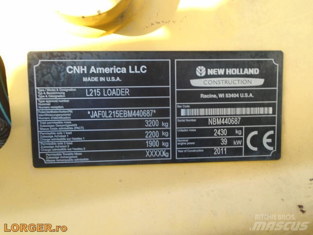 New Holland L 215 لوادر انزلاقية التوجيه