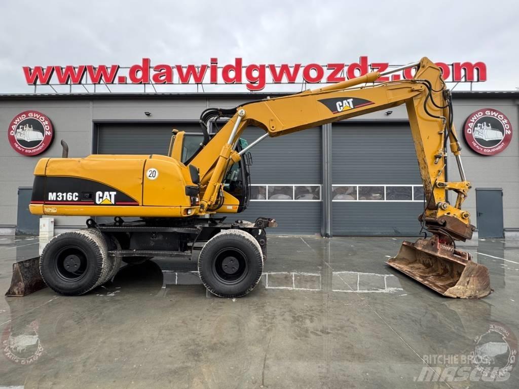 CAT M 316 C حفارات بعجل