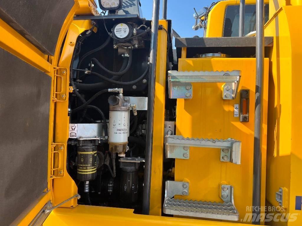 Komatsu PW 148-10 حفارات بعجل