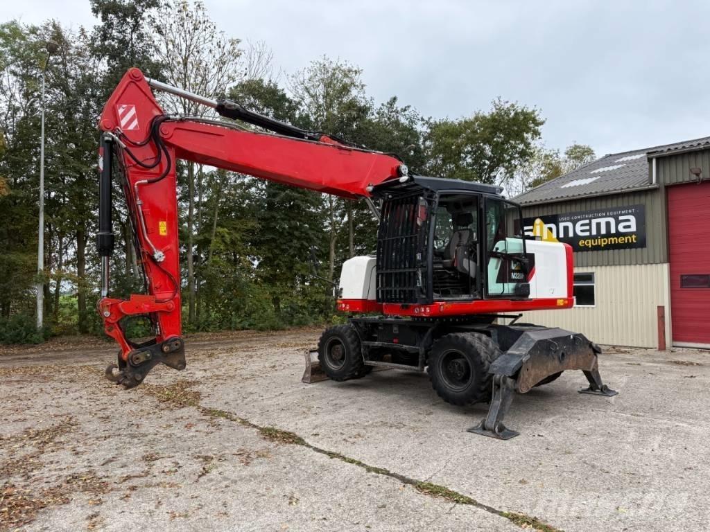CAT M320F حفارات بعجل