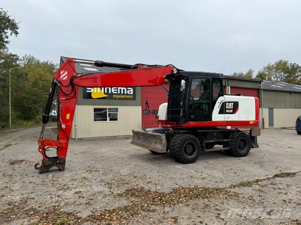 CAT M320F حفارات بعجل