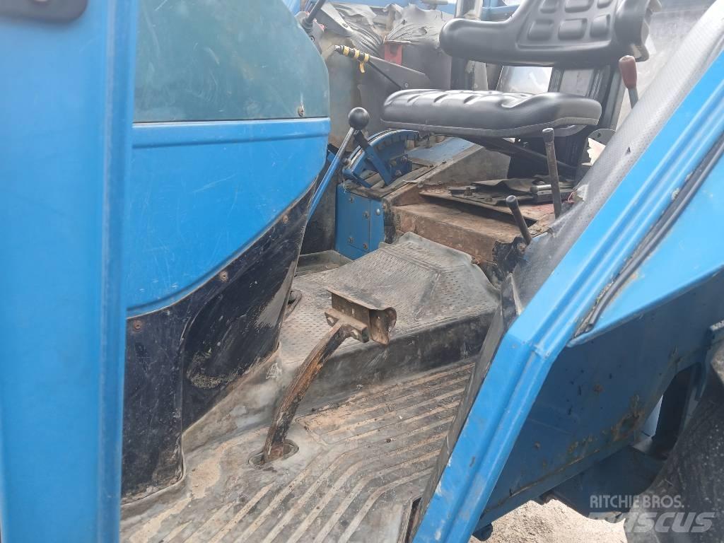 Ford 5610 Farmal الجرارات