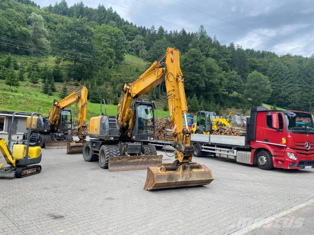 Hitachi ZX 140 W-3 حفارات بعجل