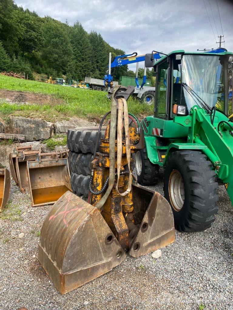 Hitachi ZX 140 W-3 حفارات بعجل