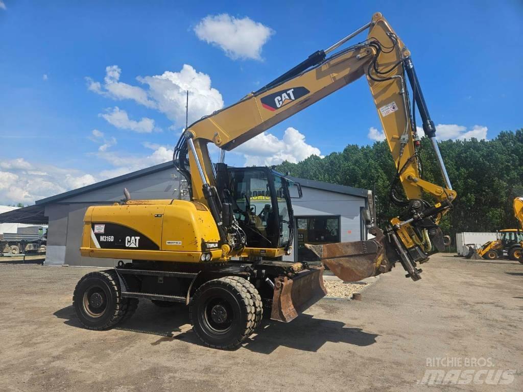CAT M 316 D حفارات بعجل