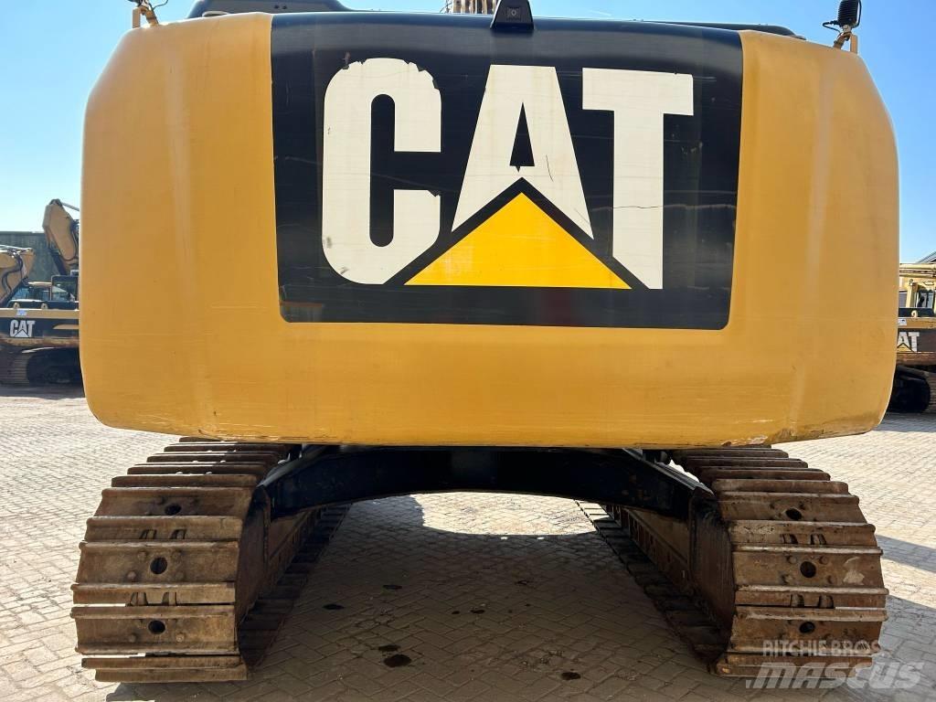 CAT 329 EL حفارات زحافة