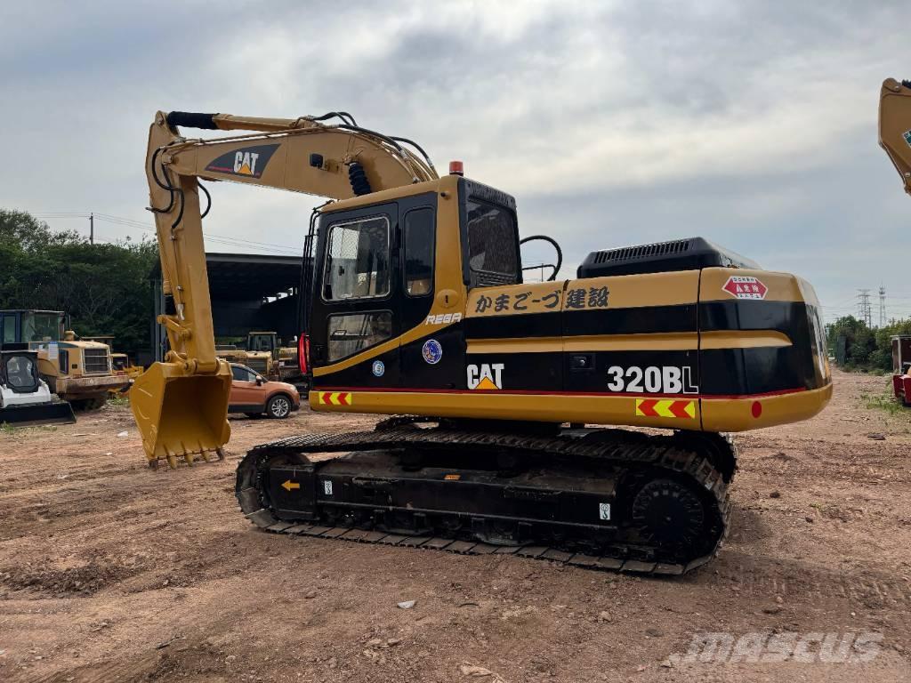 CAT 320 B L حفارات زحافة