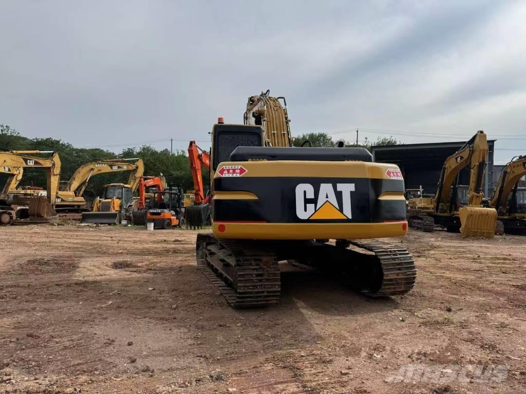 CAT 320 B L حفارات زحافة