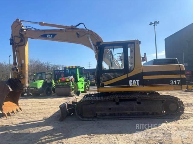 CAT 317 B L حفارات زحافة