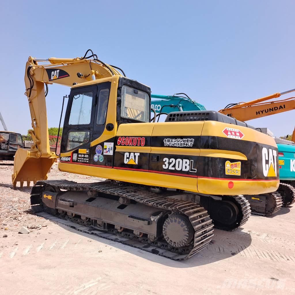 CAT 320 B L حفارات زحافة