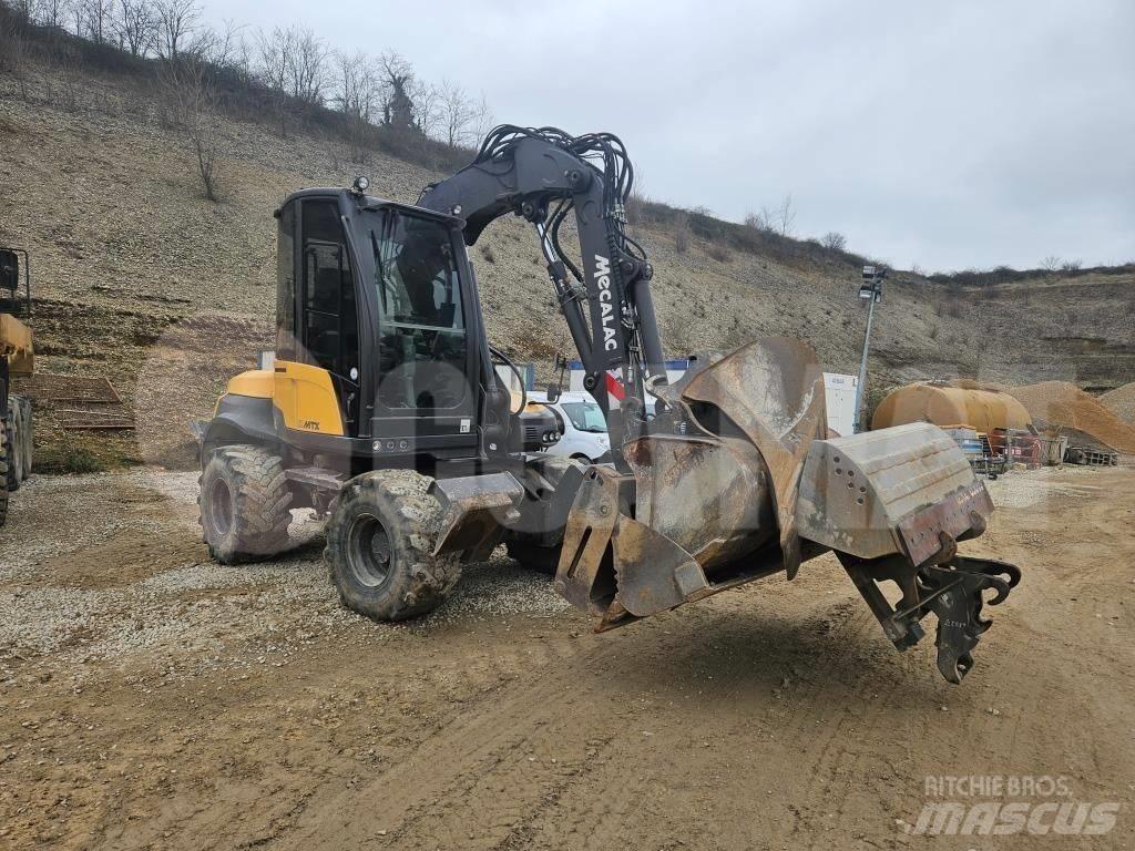 Mecalac 12 M TX حفارات بعجل